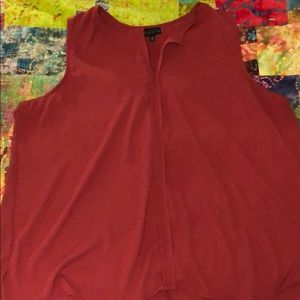 Loose fitting sleeveless blouse